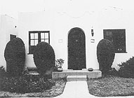 An individual bungalow in a larger court