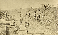 THE EARTH WAS REMOVED IN BASKETS An early California railroad construction scene.