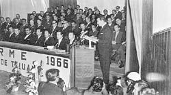 Modern day ayuntamiento (administration) in session in Tijuana. Mayor Franciso Lopez Guiterrez delivers his first informe (state of the city address), November 30, 1966. San Diego's Mayor Frank Curran is seated in the second row, second from left.