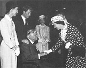 Lowell Davies is greeted by Queen Elizabeth II