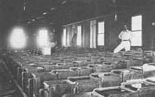 workers in the extraction room of the Free Gold cyanide plant 