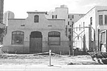 The mission building during reconstruction