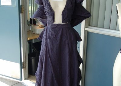 Victorian-inspired navy crinkle dress by Designer, Keith Bonar